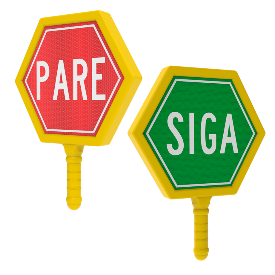 Paletas de señalización manual con diseño hexagonal: una con fondo rojo y la palabra “PARE”, y otra con fondo verde y la palabra “SIGA”, utilizadas para controlar el tránsito vehicular y peatonal en obras viales o eventos, fabricadas en polímero resistente con bordes amarillos para mayor visibilidad.